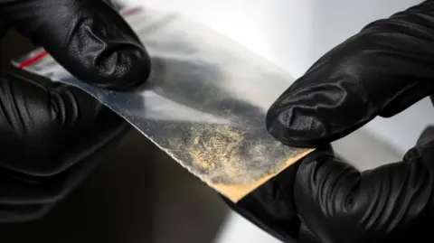 Getty Images Close up of a bag of nitazene powder sample at the Center for Forensic Science Research and Education on Friday, Oct. 20, 2023